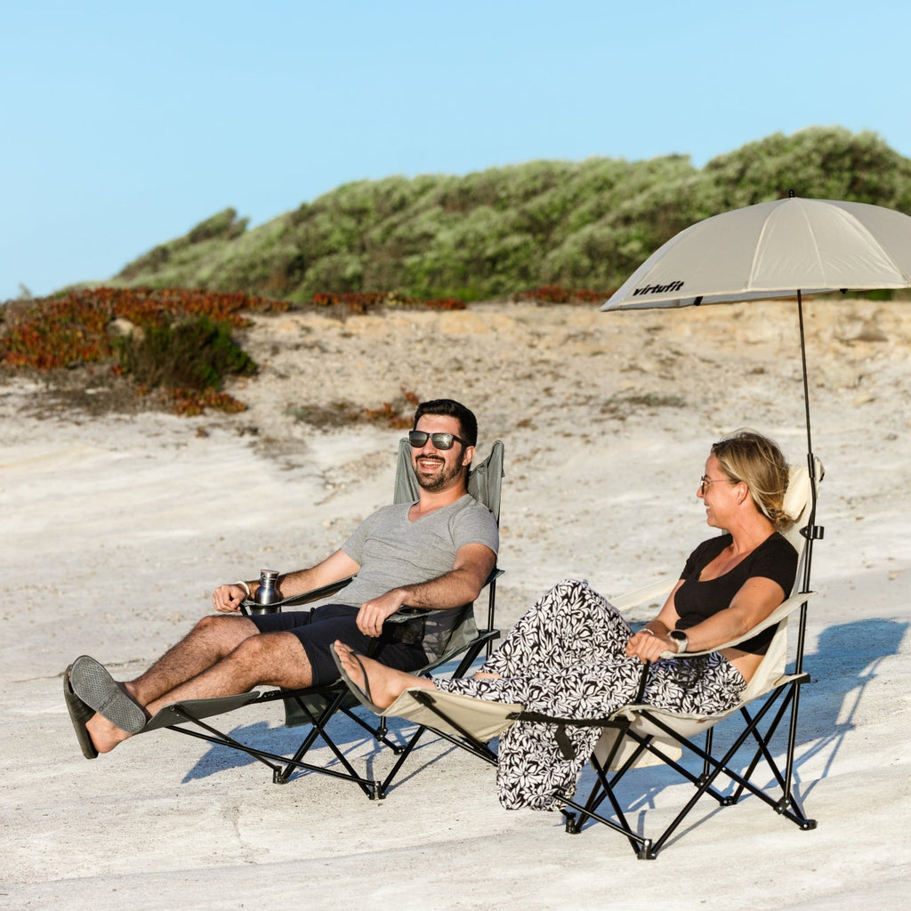 VirtuFit Campingstoel opvouwbaar met voetsteun - Strandstoel - Zwart - In gebruik