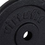 VirtuFit Gietijzeren Halterschijf - Halter gewicht - 30 mm - 15 kg - Zwart - In gebruik